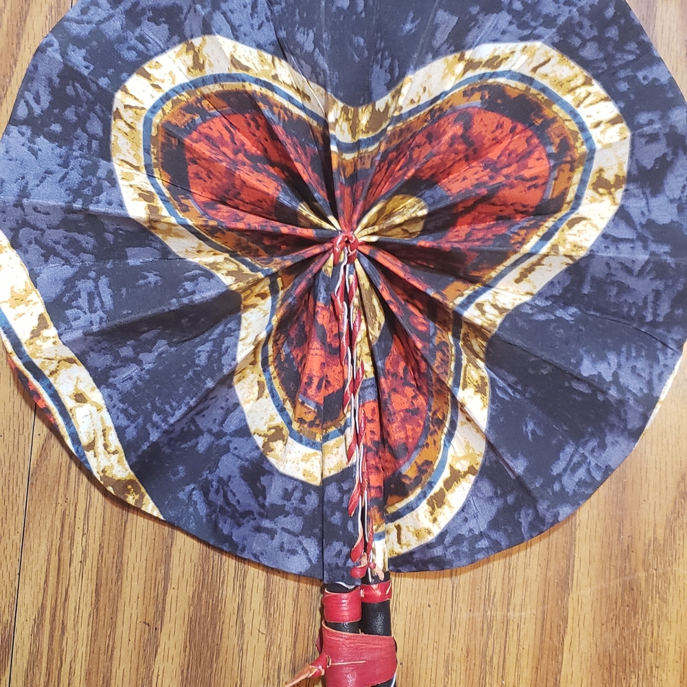 African Ankara Print Folding Fan . Made With Leather Handles .